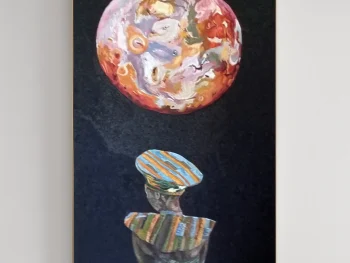 Traditional African woman with Jupiter’s above head.